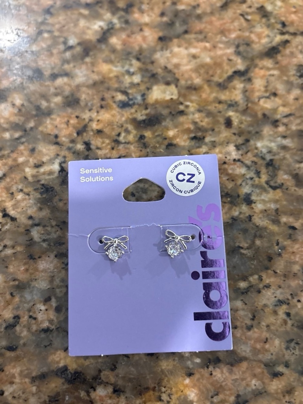 Claire's Silver Bow CZ Stud Earrings - Purple Card